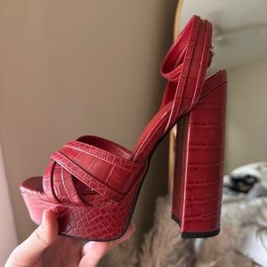 Red Aldo platform heels